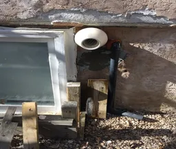 stucco damaged around the external house vent